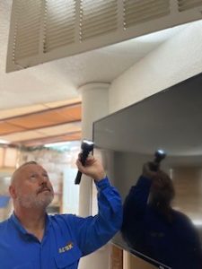 AC TEX Inspecting return vent